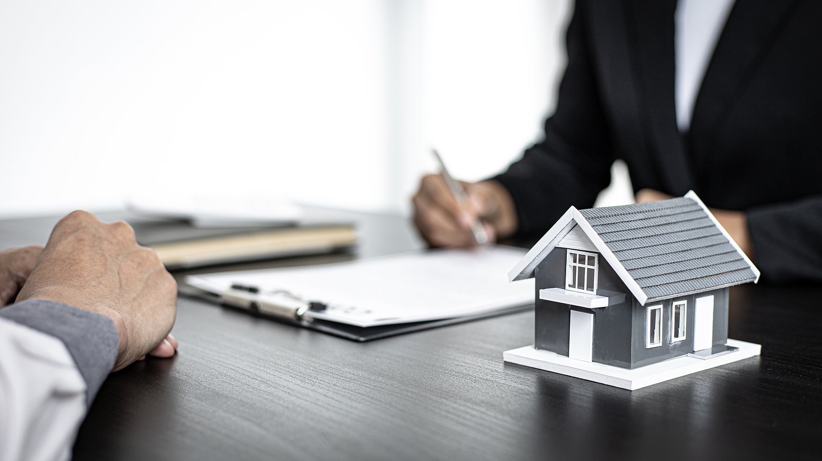 bigstock-Real-estate-broker-agents-advi-379529533